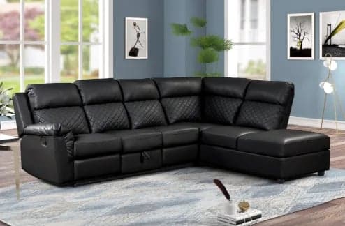 Black leather sectional sofa with recliners in a modern living room with large windows and blue walls
